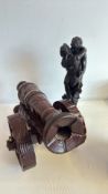 Bronze-tone Figurine and Carved Wooden Cannon Model