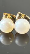 Pair of 9ct Gold earring set with pearl