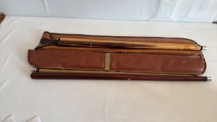 Pair of snooker cues with PowerGlide mark and leather case