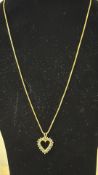 9ct Gold chain & heart pendant set with white & gr