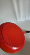 Le Creuset orange enamel cast-iron frying pan
