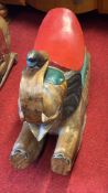 Polychrome wooden rocking elephant toy