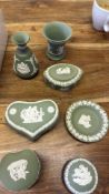 Group of Wedgwood green jasperware vases, boxes and dishes