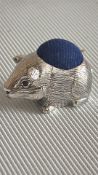 Silver guinea pig pincushion with ruby eyes
