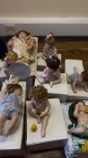 Group of 7 Ashton-Drake porcelain dolls with boxes