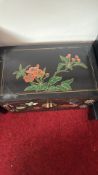 Hand-painted lacquered Asian cabinet with brass fittings