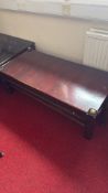 Hardwood low coffee table with brass corner caps