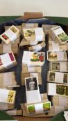 Box of vintage cigarette and trade cards