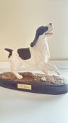 Besiwck springer spaniel on ceramic plinth