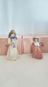 Pair of NAO by Lladro porcelain figurines, models 01107 and 01291
