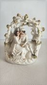 Victorian Staffordshire-style bocage courting couple figure group