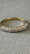 9ct Gold half eternity ring set with cz Weight 2g