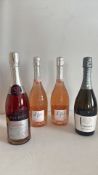 Group of 5 sparkling wine bottles