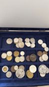 Coin album with world coins & notes