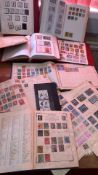 Worldwide stamp collection in albums and envelopes