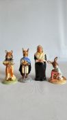 Group of 4 hand-painted ceramic rabbit figurines comprising Royal Doulton Bunnykins ‘Easter Treat’