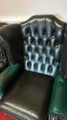Green leather wingback armchair