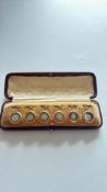 Boxed gold plated mother of pearl studs
