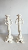 Pair of Nove Italy white ceramic putto candlesticks