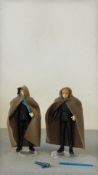 Two Kenner Star Wars Luke Skywalker Jedi Knight 3.75-inch action figures with brown cloth cloaks,