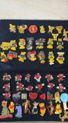 Collection of Marie Curie pin badges, British hear