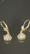Pair of 9ct Gold earrings with white stones Weight