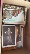 Box of vintage British postcards