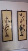 Pair of Chinese relief ceramic bird-and-flower wall panels