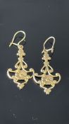 Pair of yellow metal earrings Weight 3.4g