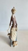 Lladro porcelain figurine of lady with parasol and dog
