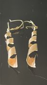 Pair of yellow metal earrings 1.3g