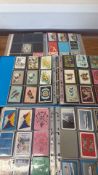 Collection of playing card backs in albums
