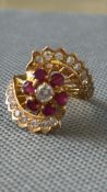 21ct Gold ring set with 21 diamonds & 6 rubies. Ce
