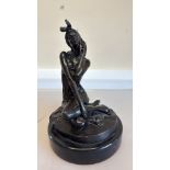 Bronze woman in dress with phone on marble base si