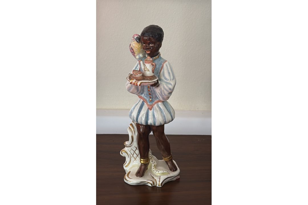 Wedgwood & Co Ltd hand-painted figural pageboy with parrot - Parrot AF - Image 1 of 5