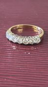 18ct Gold ring set with 7 diamonds Weight 2.5g Siz
