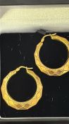Pair of 9ct gold hoop earrings Weight 3.1g