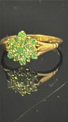 9ct Gold ring set with peridot cluster Weight 2.1g