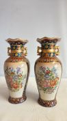 Pair of porcelain baluster vases with scalloped ri