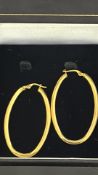 Pair of 9ct gold hoop earrings Weight 3.3g