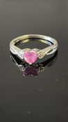 9ct White gold ring set with heart shaped pink sto