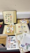 Collection of world postage stamps in albums, loose and packets