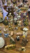 Group of Wade Whimsies and miniature ceramic figures