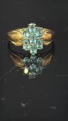 9ct Gold ring set with aquamarine cluster Weight 3
