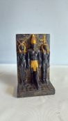Egyptian-revival resin figure group of Osiris, Isis and Horus