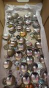 Collection of souvenir enamel-crested caddy spoons