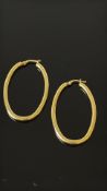 Pair of 9ct gold hoop earrings Weight 3.3g