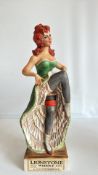 Lionstone Whisky 'The Dance Hall Girl' sculptured porcelain decanter, 1973