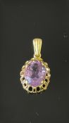 18ct Gold pendant set with amethyst 1.1g