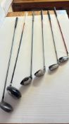 Set of 6 golf clubs: John Daly driver, Ping G2 wood, Ping G20/G15 hybrids